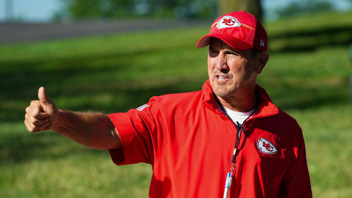 Jul 28, 2023; St. Joseph, MO, USA; Kansas City Chiefs defensive coordinator Steve Spagnuolo greets fans as he takes the field for training camp at Missouri Western State University. Mandatory Credit: Jay Biggerstaff-Imagn Images