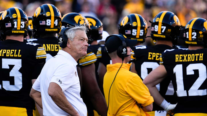 Iowa Hawkeyes head coach Kirk Ferentz huddles with his team during a football game against the Indiana Hoosiers Sept. 27, 2025 at Kinnick Stadium in Iowa City, Iowa.