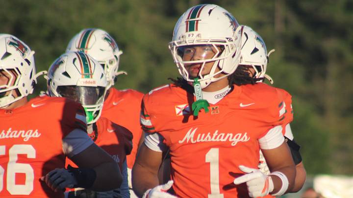 Mandarin wide receiver Brysen Wright (1) runs onto the field with the offense for the Mustangs' first possession against Fletcher in high school football on Sept. 25, 2026. [Clayton Freeman/Florida Times-Union]