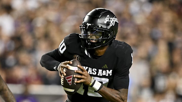 Oct 26, 2024; College Station, Texas, USA; Texas A&M Aggies quarterback Marcel Reed (10) runs the ball in the fourth quarter against the LSU Tigers at Kyle Field. Mandatory Credit: Maria Lysaker-Imagn Images. 