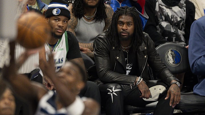 Dallas Cowboys linebacker Micah Parsons and cornerback Trevon Diggs (right) watch the game between the Dallas Mavericks and the Minnesota Timberwolves,