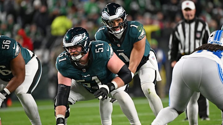 Nov 16, 2025; Philadelphia, Pennsylvania, USA; Philadelphia Eagles quarterback Jalen Hurts (1) takes the snap from center Cam Jurgens (51) against the Detroit Lions at Lincoln Financial Field. Mandatory Credit: Eric Hartline-Imagn Images