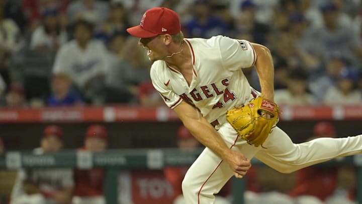 Sep 3, 2024; Anaheim, California, USA;  Los Angeles Angels relief pitcher Ben Joyce (44) strikes out Los Angeles Dodgers shortstop Tommy Edman (25) on a 105.5 mph pitch in the eighth inning at Angel Stadium. Mandatory Credit: Jayne Kamin-Oncea-Imagn Images