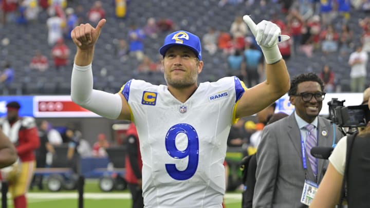 Sep 22, 2024; Inglewood, California, USA;  Los Angeles Rams quarterback Matthew Stafford (9) celebrates as he leaves the field after defeating the San Francisco 49ers at SoFi Stadium. Mandatory Credit: Jayne Kamin-Oncea-Imagn Images