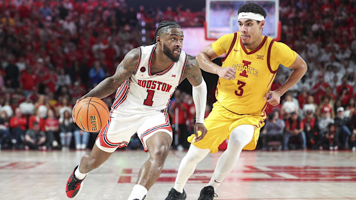 Feb 19, 2024; Houston, Texas, USA; Houston Cougars guard Jamal Shead (1) drives with the ball as