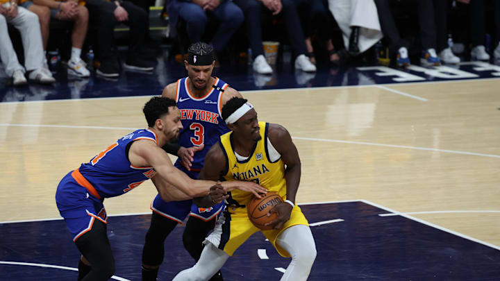 May 25, 2025; Indianapolis, Indiana, USA; Indiana Pacers center Thomas Bryant (3) steals a ball from New York Knicks guard Landry Shamet (44) during the fourth quarter of game three of the eastern conference finals for the 2025 NBA Playoffs at Gainbridge Fieldhouse. Mandatory Credit: Trevor Ruszkowski-Imagn Images May 25, 2025; Indianapolis, Indiana, USA; Indiana Pacers center Thomas Bryant (3) steals a ball from New York Knicks guard Landry Shamet (44) during the fourth quarter of game three of the eastern conference finals for the 2025 NBA Playoffs at Gainbridge Fieldhouse. Mandatory Credit: Trevor Ruszkowski-Imagn Images