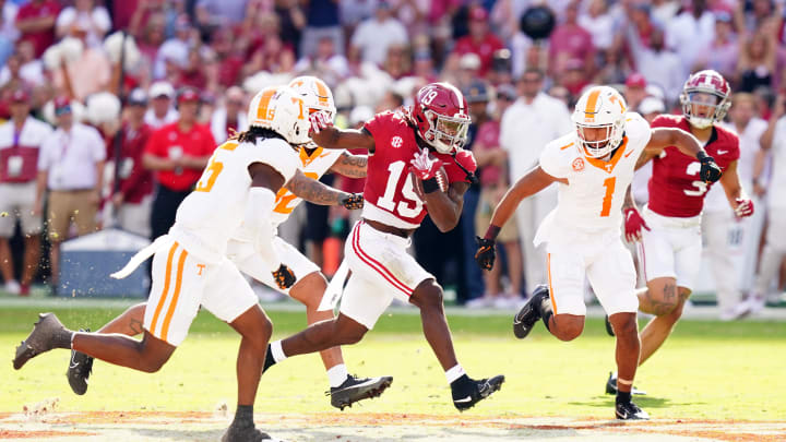 Oct 21, 2023; Tuscaloosa, Alabama, USA; Alabama Crimson Tide wide receiver Kendrick Law (19) carries the ball against the Tennessee Volunteers during the first half at Bryant-Denny Stadium. Mandatory Credit: John David Mercer-USA TODAY Sports Oct 21, 2023; Tuscaloosa, Alabama, USA; Alabama Crimson Tide wide receiver Kendrick Law (19) carries the ball against the Tennessee Volunteers during the first half at Bryant-Denny Stadium. Mandatory Credit: John David Mercer-USA TODAY Sports