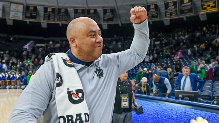 Dec 30, 2023; South Bend, Indiana, USA; Notre Dame Fighting Irish head coach Micah Shrewsberry celebrates as he leaves the court following the 76-54 win over the Virginia Cavaliers at the Purcell Pavilion. Mandatory Credit: Matt Cashore-Imagn Images Dec 30, 2023; South Bend, Indiana, USA; Notre Dame Fighting Irish head coach Micah Shrewsberry celebrates as he leaves the court following the 76-54 win over the Virginia Cavaliers at the Purcell Pavilion. Mandatory Credit: Matt Cashore-Imagn Images