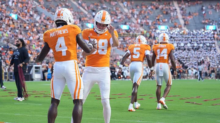 Tennessee wide receiver Mike Matthews (4) and punter Jackson Ross (98) warming up before the starts of the college football game against Kennesaw State on Sept. 19, 2026, in Knoxville, Tennessee. Tennessee wide receiver Mike Matthews (4) and punter Jackson Ross (98) warming up before the starts of the college football game against Kennesaw State on Sept. 19, 2026, in Knoxville, Tennessee.