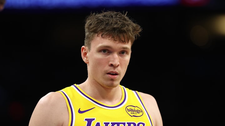 Los Angeles Lakers forward Dalton Knecht (4) against the Phoenix Suns at Mortgage Matchup Center on December 23, 2025.
