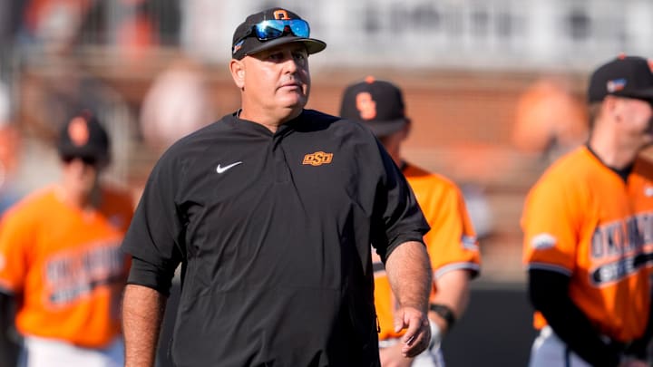Oklahoma State coach Josh Holiday walks on the field before a college Bedlam baseball game between the University of Oklahoma Sooners (OU) and the Oklahoma State University Cowboys (OSU) at O'Brate Stadium in Stillwater, Okla., Tuesday, April 15, 2025.