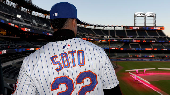 New York Mets right fielder Juan Soto poses for photos during a press conference at Citi Field in 2024.