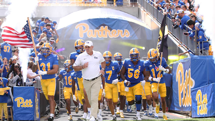 Aug 30, 2025; Pittsburgh, Pennsylvania, USA; Pittsburgh Panthers head coach Pat Narduzzi (middle) leads the team onto the field to play the Duquesne Dukes at Acrisure Stadium. Mandatory Credit: Charles LeClaire-Imagn Images Aug 30, 2025; Pittsburgh, Pennsylvania, USA; Pittsburgh Panthers head coach Pat Narduzzi (middle) leads the team onto the field to play the Duquesne Dukes at Acrisure Stadium. Mandatory Credit: Charles LeClaire-Imagn Images