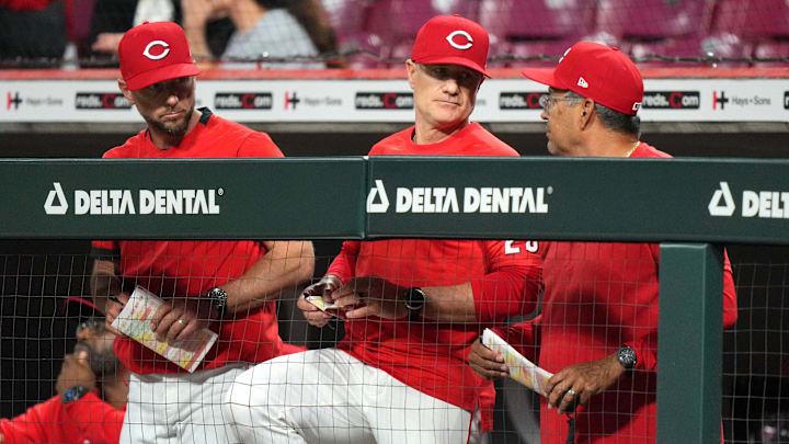 Cincinnati Reds manager David Bell (25), center, talks with Cincinnati Reds bench coach Freddie Benavides (45), right, and Cincinnati Reds game planning/infield coach Jeff Pickler (61) in the ninth inning of a baseball game Baltimore Orioles, Saturday, May 4, 2024, at Great American Ball Park in Cincinnati. The Baltimore Orioles won, 2-1. Cincinnati Reds manager David Bell (25), center, talks with Cincinnati Reds bench coach Freddie Benavides (45), right, and Cincinnati Reds game planning/infield coach Jeff Pickler (61) in the ninth inning of a baseball game Baltimore Orioles, Saturday, May 4, 2024, at Great American Ball Park in Cincinnati. The Baltimore Orioles won, 2-1.