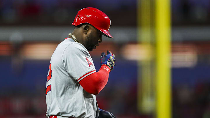 Apr 20, 2024; Cincinnati, Ohio, USA; Los Angeles Angels designated hitter Miguel Sano (22) reacts