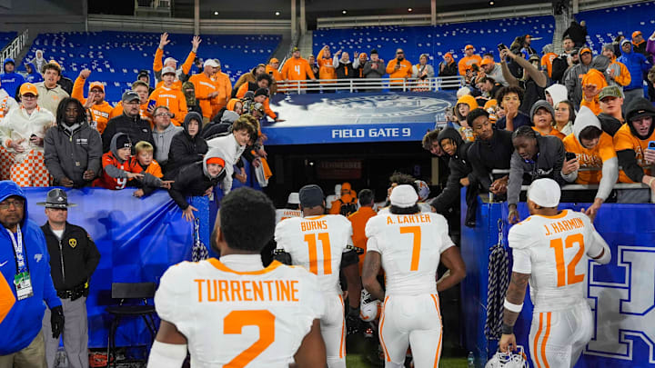 The Tennessee football team enters the tunnel while high-fiving fans after winning a NCAA football game against Kentucky at Kroger Field in Lexington, Kentucky on Oct. 25, 2025. The Tennessee football team enters the tunnel while high-fiving fans after winning a NCAA football game against Kentucky at Kroger Field in Lexington, Kentucky on Oct. 25, 2025.