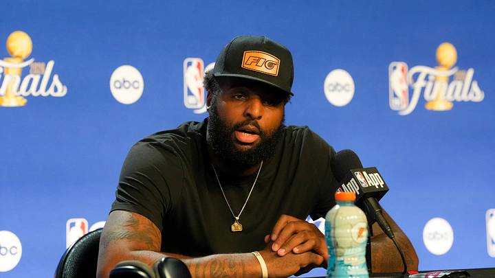 New York Knicks center Mitchell Robinson (23) speaks with the media after the game between the Spurs and the Knicks in game two of the 2026 NBA Finals at Frost Bank Center. New York Knicks center Mitchell Robinson (23) speaks with the media after the game between the Spurs and the Knicks in game two of the 2026 NBA Finals at Frost Bank Center.