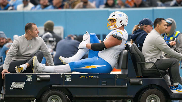 Nov 2, 2025; Nashville, Tennessee, USA;  Los Angeles Chargers offensive tackle Joe Alt (76) gets carted off against the Tennessee Titans during the first half at Nissan Stadium. Mandatory Credit: Steve Roberts-Imagn Images