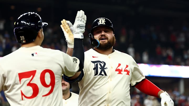 Sep 19, 2025; Arlington, Texas, USA; Texas Rangers first baseman Rowdy Tellez (44) celebrates with Texas Rangers second baseman Cody Freeman (39) after hitting a two-run home run during the tenth inning against the Miami Marlins at Globe Life Field. Mandatory Credit: Kevin Jairaj-Imagn Images Sep 19, 2025; Arlington, Texas, USA; Texas Rangers first baseman Rowdy Tellez (44) celebrates with Texas Rangers second baseman Cody Freeman (39) after hitting a two-run home run during the tenth inning against the Miami Marlins at Globe Life Field. Mandatory Credit: Kevin Jairaj-Imagn Images