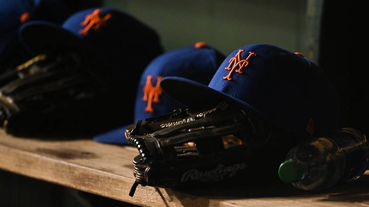 Apr 8, 2022; Washington, District of Columbia, USA;  A detail view of New York Mets hats and gloves during the game between the Washington Nationals and the New York Mets at Nationals Park. Mandatory Credit: Tommy Gilligan-Imagn Images