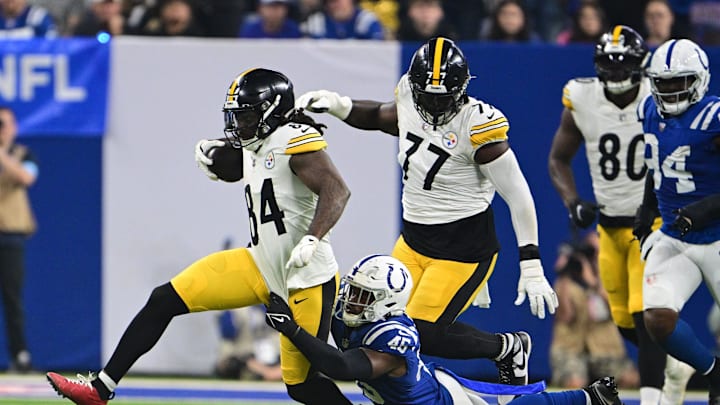 Sep 29, 2024; Indianapolis, Indiana, USA; Pittsburgh Steelers running back Cordarrelle Patterson (84) is tackled by Indianapolis Colts linebacker E.J. Speed (45) during the second quarter at Lucas Oil Stadium. Mandatory Credit: Marc Lebryk-Imagn Images