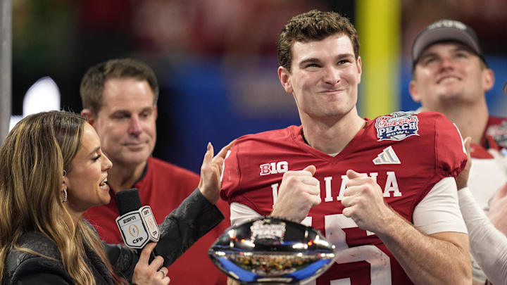 Indiana Hoosiers quarterback Fernando Mendoza (15) reacts after the 2025 Peach Bowl and semifinal game of the College Football Playoff at Mercedes-Benz Stadium. Mandatory Credit: Dale Zanine-Imagn Images