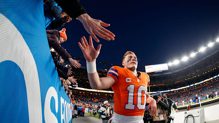 Jan 5, 2025; Denver, Colorado, USA; Denver Broncos quarterback Bo Nix (10) celebrates with fans after the game against the Kansas City Chiefs at Empower Field at Mile High. Mandatory Credit: Isaiah J. Downing-Imagn Images Jan 5, 2025; Denver, Colorado, USA; Denver Broncos quarterback Bo Nix (10) celebrates with fans after the game against the Kansas City Chiefs at Empower Field at Mile High. Mandatory Credit: Isaiah J. Downing-Imagn Images