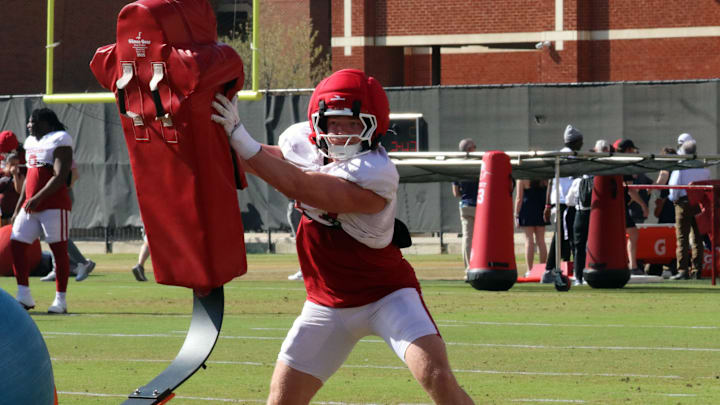 Oklahoma linebacker James Nesta hits a sled during one of the Sooners' spring practices. Oklahoma linebacker James Nesta hits a sled during one of the Sooners' spring practices.