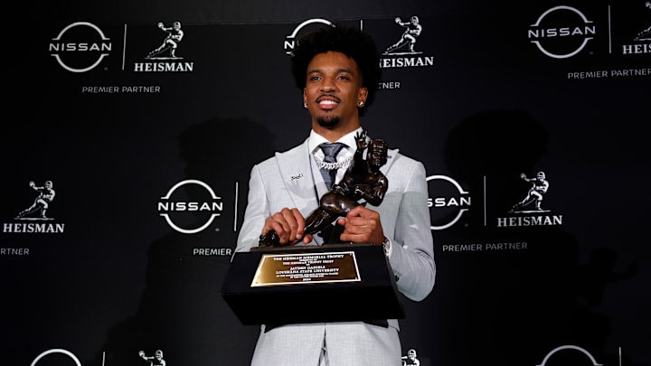 LSU quarterback Jayden Daniels receives the 2023 Heisman Trophy.