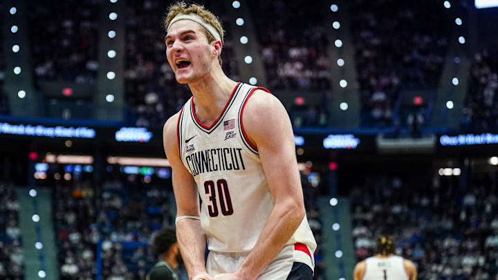 Feb 26, 2025; Hartford, Connecticut, USA; UConn Huskies forward Liam McNeeley (30) reacts after a play against the Georgetown Hoyas in the second half at XL Center. Mandatory Credit: David Butler II-Imagn Images