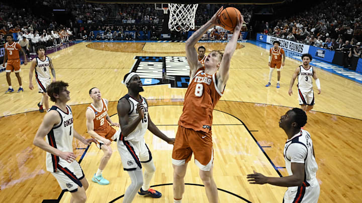 Mar 21, 2026; Portland, OR, USA; Texas Longhorns center Matas Vokietaitis (8) shoots against Gonzaga Bulldogs forward Graham Ike (15) in the first half during a second round game of the men's 2026 NCAA Tournament at Moda Center. Mandatory Credit: Troy Wayrynen-Imagn Images