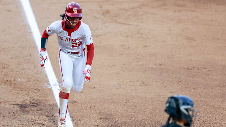 Oklahoma freshman Kai Minor races home to score at Love's Field.