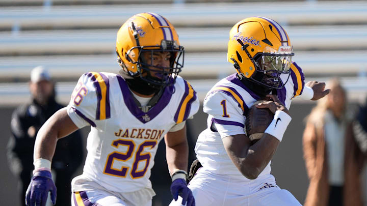 Dec 6, 2024; Birmingham, AL, USA; Jackson's Landon Duckworth (1) runs the ball against Cherokee County at Protective Stadium in the AHSAA 4A State Championship game. Dec 6, 2024; Birmingham, AL, USA; Jackson's Landon Duckworth (1) runs the ball against Cherokee County at Protective Stadium in the AHSAA 4A State Championship game.