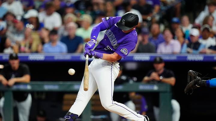 Colorado Rockies first baseman TJ Rumfield (7) singles at Coors Field. Credit: Ron Chenoy-Imagn Images Colorado Rockies first baseman TJ Rumfield (7) singles at Coors Field. Credit: Ron Chenoy-Imagn Images