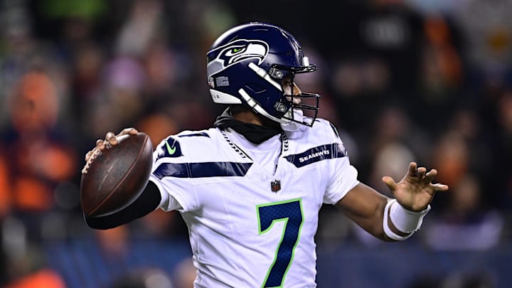 Dec 26, 2024; Chicago, Illinois, USA; Seattle Seahawks quarterback Geno Smith (7) looks to pass against the Chicago Bears during the second quarter at Soldier Field. Mandatory Credit: Daniel Bartel-Imagn Images