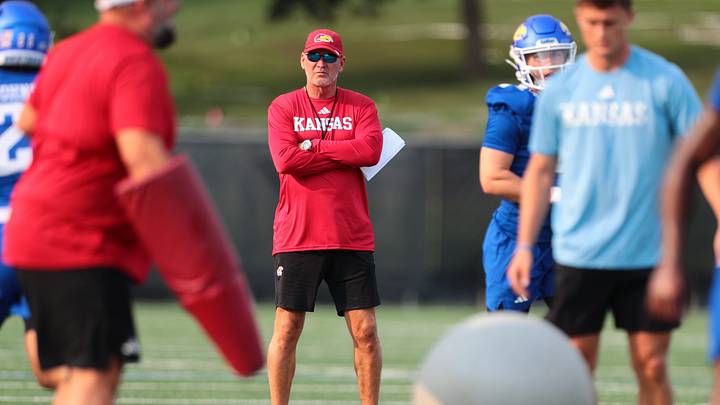 Kansas football coach Lance Leipold watches players during fall camp practice on Aug. 4, 2026. Kansas football coach Lance Leipold watches players during fall camp practice on Aug. 4, 2026.