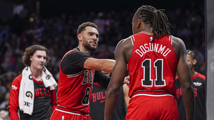 Chicago Bulls guard Zach LaVine (8) reacts after guard Ayo Dosunmu (11) scored a basket against the Atlanta Hawks during the second half at State Farm Arena. 