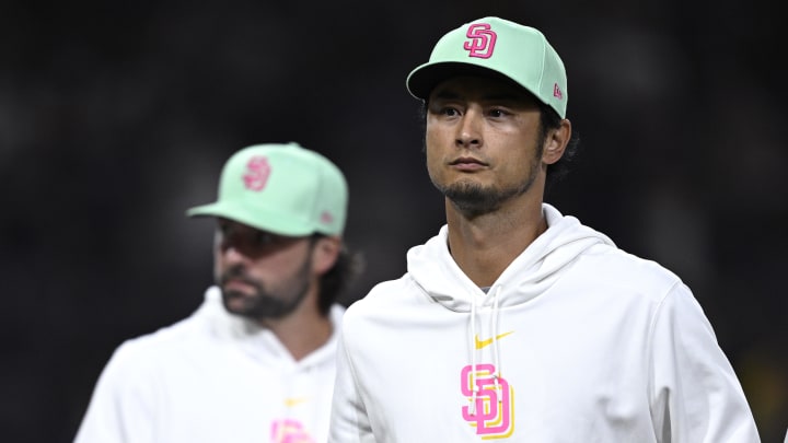 Jun 21, 2024; San Diego, California, USA; San Diego Padres pitcher Yu Darvish walks off the field after defeating the Milwaukee Brewers at Petco Park. Mandatory Credit: Orlando Ramirez-USA TODAY Sports