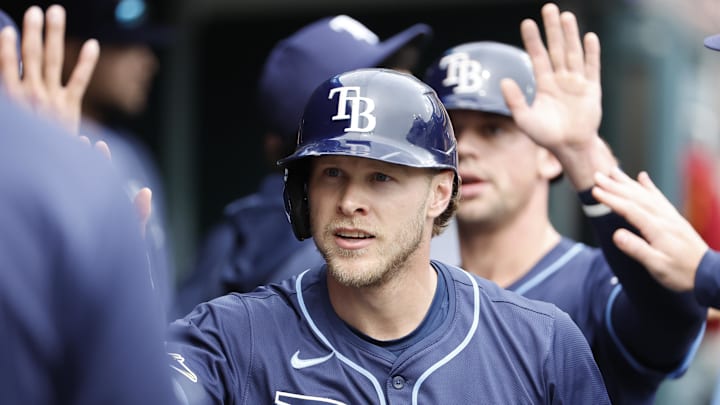 Sep 26, 2024; Detroit, Michigan, USA;  Tampa Bay Rays shortstop Taylor Walls (6) receives congratulations from teammates after scoring in the third inning against the Detroit Tigers at Comerica Park. 