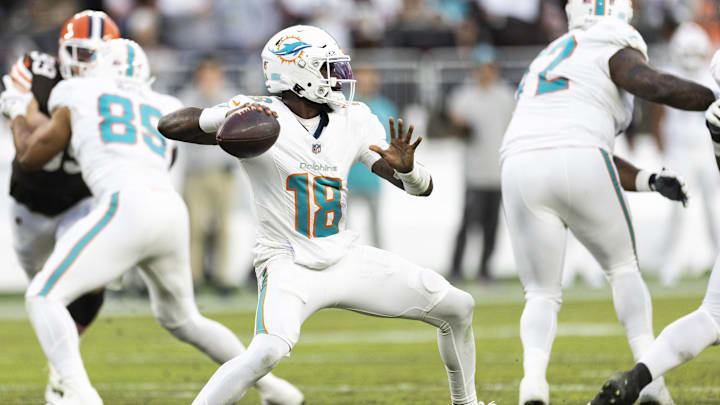 Dec 29, 2024; Cleveland, Ohio, USA; Miami Dolphins quarterback Tyler Huntley (18) throws the ball against the Cleveland Browns during the second quarter at Huntington Bank Field. 