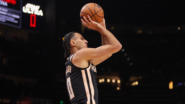Feb 7, 2026; Atlanta, Georgia, USA; Atlanta Hawks forward Zaccharie Risacher (10) shoots against the Charlotte Hornets in the first quarter at State Farm Arena. Mandatory Credit: Brett Davis-Imagn Images