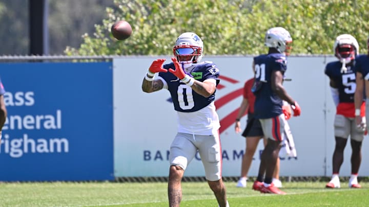 Jul 28, 2025; Foxborough, MA, USA; New England Patriots cornerback Christian Gonzalez (0) does a drill during training camp at Gillette Stadium. Mandatory Credit: Eric Canha-Imagn Images