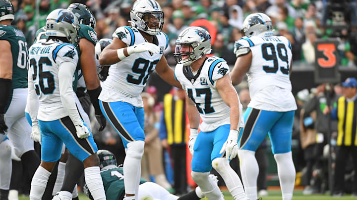 Dec 8, 2024; Philadelphia, Pennsylvania, USA; Carolina Panthers linebacker Josey Jewell (47) reacts after sacking Philadelphia Eagles quarterback Jalen Hurts (1) during the first quarter at Lincoln Financial Field. Mandatory Credit: Eric Hartline-Imagn Images
