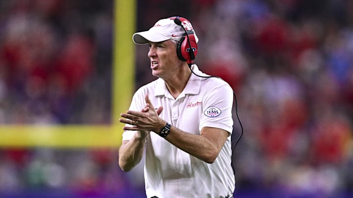 Dec 27, 2025; Houston, TX, USA; Houston Cougars head coach Willie Fritz reacts during the first half against the Louisiana State Tigers at NRG Stadium. Mandatory Credit: Maria Lysaker-Imagn Images 