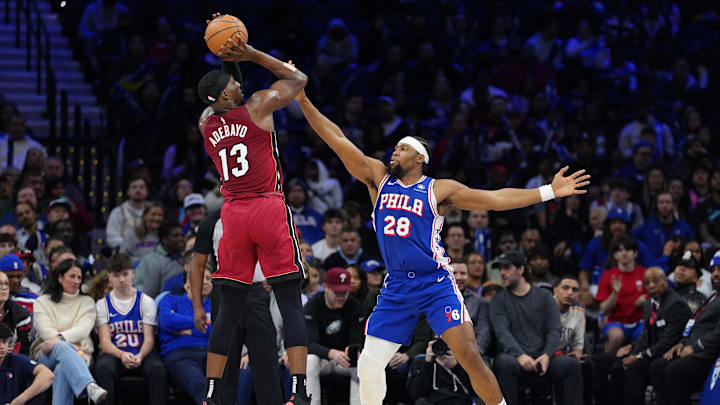 Feb 5, 2025; Philadelphia, Pennsylvania, USA; Miami Heat center Bam Adebayo (13) shoots the ball against Philadelphia 76ers forward Guerschon Yabusele (28) in the fourth quarter at Wells Fargo Center. Mandatory Credit: Kyle Ross-Imagn Images