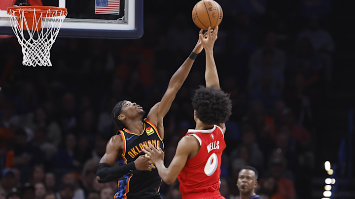 Dec 29, 2024; Oklahoma City, Oklahoma, USA; Oklahoma City Thunder guard Shai Gilgeous-Alexander (2) blocks a shot by Memphis Grizzlies forward Jaylen Wells (0) during the second quarter at Paycom Center. Mandatory Credit: Alonzo Adams-Imagn Images Dec 29, 2024; Oklahoma City, Oklahoma, USA; Oklahoma City Thunder guard Shai Gilgeous-Alexander (2) blocks a shot by Memphis Grizzlies forward Jaylen Wells (0) during the second quarter at Paycom Center. Mandatory Credit: Alonzo Adams-Imagn Images
