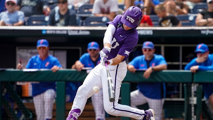 Jun 21, 2023; Omaha, NE, USA; TCU Horned Frogs third baseman Brayden Taylor (55) hits a single