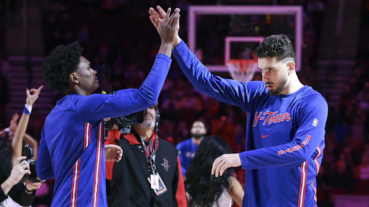 Jan 31, 2026; Houston, Texas, USA; Houston Rockets guard Amen Thompson (1) and center Alperen Sengun (28) high five on the court before the game against the Dallas Mavericks at Toyota Center. Mandatory Credit: Troy Taormina-Imagn Images