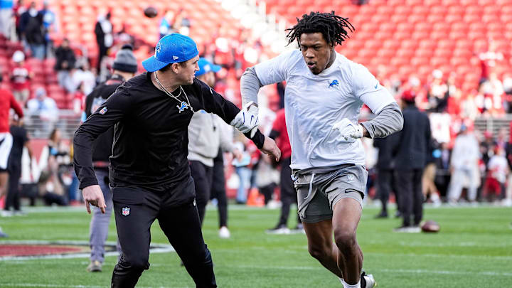 Detroit Lions wide receiver Jameson Williams (9) practice withs assistant wide receivers coach Seth Ryan during warm up before the game between San Francisco 49ers and Detroit Lions at Levi's Stadium in Santa Clara, Calif. on Monday, Dec. 30, 2024.