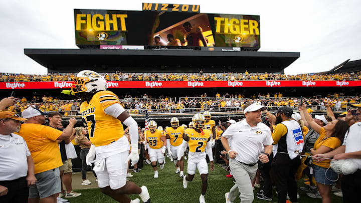 Sep 21, 2024; Columbia, Missouri, USA; Missouri Tigers head coach Eliah Drinkwitz leads his team onto the field prior to a game against the Vanderbilt Commodores at Faurot Field at Memorial Stadium. Mandatory Credit: Jay Biggerstaff-Imagn Images Sep 21, 2024; Columbia, Missouri, USA; Missouri Tigers head coach Eliah Drinkwitz leads his team onto the field prior to a game against the Vanderbilt Commodores at Faurot Field at Memorial Stadium. Mandatory Credit: Jay Biggerstaff-Imagn Images